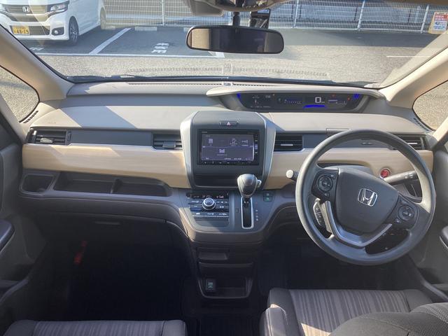 フリード Ｇ・ホンダセンシング　純正ナビテレビ・フリップダウンモニター・ドライブレコーダー・Ｂｌｕｅｔｏｏｔｈ・ワンオーナー車　Ｆセグ　追突被害軽減ブレーキ　ｉストップ　電格ドアミラー　Ｗエアバッグ　パワーウィンドウ　ＡＵＸ対応（4枚目）