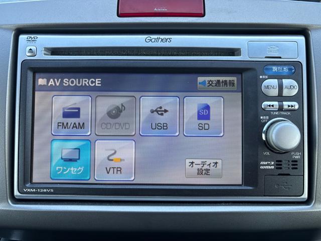 フリード Ｇ　ジャストセレクション　ＥＴＣ　バックカメラ　ナビ　ＴＶ　両側スライド・片側電動　スマートキー　電動格納ミラー　３列シート　ウォークスルー　ＣＶＴ　ＣＤ　ＤＶＤ再生　ＵＳＢ　盗難防止システム　衝突安全ボディ　ＡＢＳ　ＥＳＣ（5枚目）