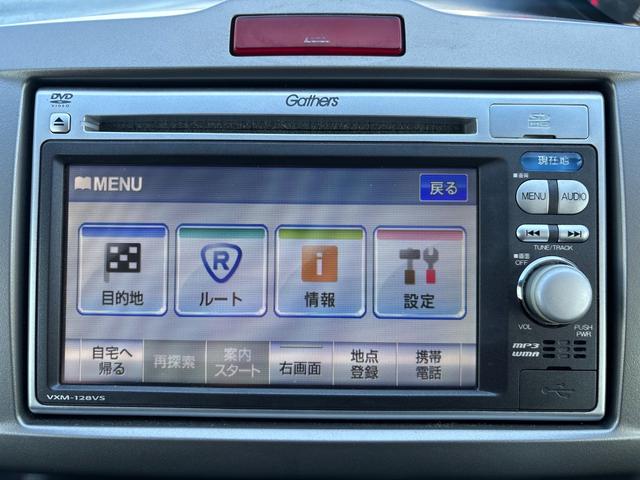 フリード Ｇ　ジャストセレクション　ＥＴＣ　バックカメラ　ナビ　ＴＶ　両側スライド・片側電動　スマートキー　電動格納ミラー　３列シート　ウォークスルー　ＣＶＴ　ＣＤ　ＤＶＤ再生　ＵＳＢ　盗難防止システム　衝突安全ボディ　ＡＢＳ　ＥＳＣ（6枚目）