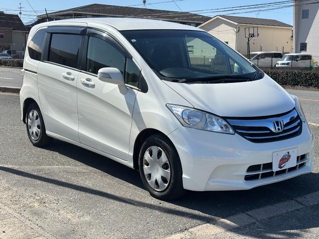 フリード Ｇ　ジャストセレクション　ＥＴＣ　バックカメラ　ナビ　ＴＶ　両側スライド・片側電動　スマートキー　電動格納ミラー　３列シート　ウォークスルー　ＣＶＴ　ＣＤ　ＤＶＤ再生　ＵＳＢ　盗難防止システム　衝突安全ボディ　ＡＢＳ　ＥＳＣ（12枚目）