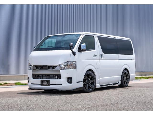 ハイエースバン スーパーＧＬ　ダークプライムＩＩ　４１５ＣＯＢＲＡ新車コンプリート　クリーンルックエアロ／Ｃ２サイドステップ／ステージ１リアバンパー／バッドラッカー　アルミホイール／プレステージＬＥＤテール／玄武ローダウン／ｂｙ２ボンネット（2枚目）