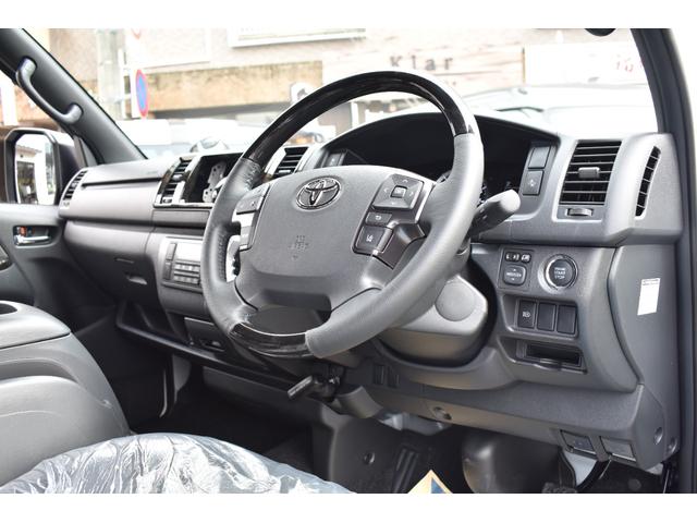 ハイエースバン スーパーＧＬ　ダークプライムＩＩ　４１５ＣＯＢＲＡ新車コンプリート　クリーンルックエアロ／Ｃ２サイドステップ／ステージ１リアバンパー／バッドラッカー　アルミホイール／プレステージＬＥＤテール／玄武ローダウン／ｂｙ２ボンネット（16枚目）
