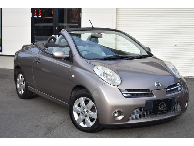 マイクラＣ＋Ｃ ベースグレード　女性ワンオーナー／禁煙車／キーレス／ハーフレザーシート／本革巻きステアリング／シートヒーター／電動オープン／純正ナビ／地デジＴＶ／社外デジタルインナーミラー／シートヒーター／点検整備記録簿（10枚目）