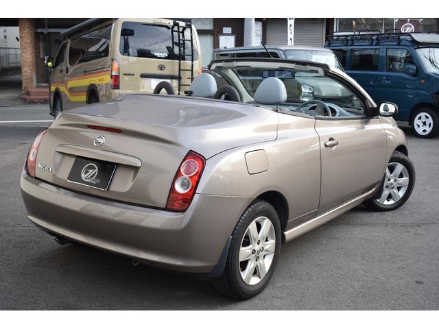 マイクラＣ＋Ｃ ベースグレード　女性ワンオーナー／禁煙車／キーレス／ハーフレザーシート／本革巻きステアリング／シートヒーター／電動オープン／純正ナビ／地デジＴＶ／社外デジタルインナーミラー／シートヒーター／点検整備記録簿（12枚目）