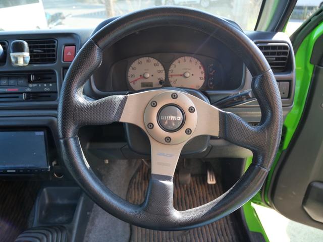 ジムニー ランドベンチャー　リフトアップ　ＦＲバンパー　ブッシュガード　社外１６インチアルミホイール　ＭＯＭＯステアリング　キーレスエントリー　社外マフラー　ナビ　レカロシート（22枚目）