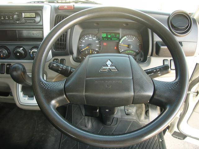 キャンター ロング全低床　２ｔ　オートマ　ＦＭＡＭラジオ　インフォメーションモニター　ＥＴＣ　坂道発進補助装置　ＥＣＯモード　電動ミラー　オーバーヘッドシェルフ　センターコンソール　運転席エアバック　ＡＢＳ（13枚目）