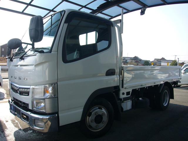 キャンター 全低床 2t オートマ 自動被害軽減ブレーキ 車線逸脱警報・横滑り防止装置 坂道発進補助装置 ETC キーレス インフォメーションモニター アームレスト オーバーヘッドシェルフ 荷台鉄板張り 荷台新塗装済(2枚目)