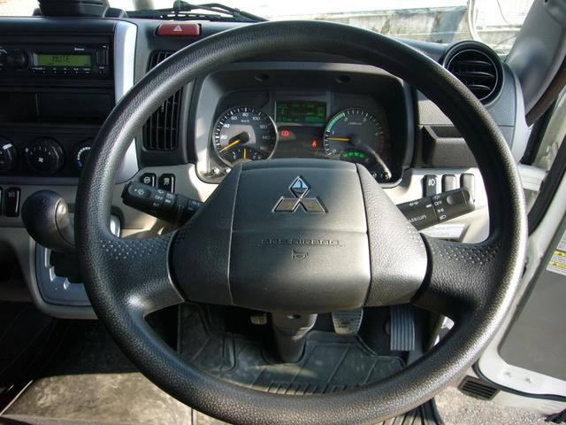 キャンター 全低床 2t オートマ 自動被害軽減ブレーキ 車線逸脱警報・横滑り防止装置 坂道発進補助装置 ETC キーレス インフォメーションモニター アームレスト オーバーヘッドシェルフ 荷台鉄板張り 荷台新塗装済(12枚目)