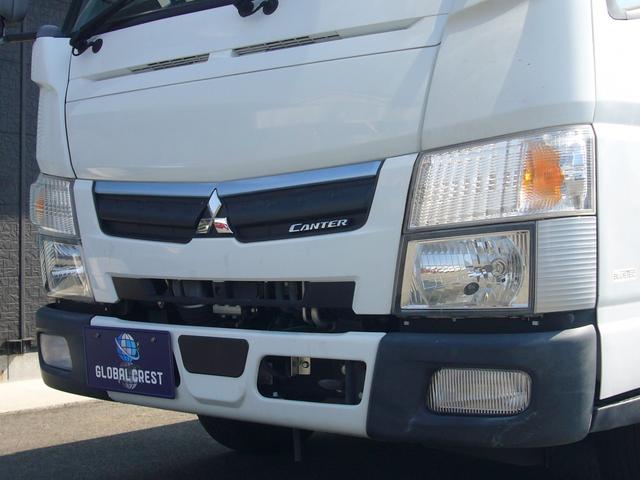 キャンター 全低床　２ｔ　５速ＭＴ　自動被害軽減ブレーキ　車線逸脱警報・横滑り防止装置　ＥＴＣ　キーレス　ＦＭＡＭラジオ　Ｂｔオーディオ　インフォメーションモニター　オーバーヘッドシェルフ　　荷台鉄板張り　荷台新塗装済（22枚目）