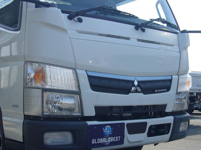 キャンター 全低床　２ｔ　５速ＭＴ　自動被害軽減ブレーキ　車線逸脱警報・横滑り防止装置　ＥＴＣ　キーレス　ＦＭＡＭラジオ　Ｂｔオーディオ　インフォメーションモニター　オーバーヘッドシェルフ　　荷台鉄板張り　荷台新塗装済（52枚目）