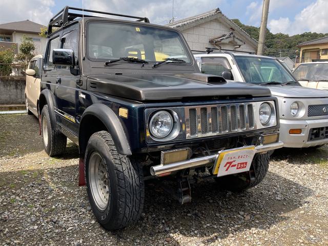 ジムニー ワイルドウインドリミテッド　４ＷＤ　カセット　アルミホイール　オートマチック車　背面タイヤ　車検令和６年３月迄　修復歴有　エアコン　フォグランプ　ルーフキャリア　ターボ　社外ステアリング（15枚目）