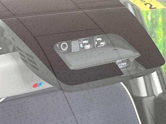 L 禁煙車 CDオーディオ 衝突軽減ブレーキ オートハイビーム シートヒーター 車線逸脱警報機能 誤発進抑制装置 アイドリングストップ クリアランスソナー オートライト 盗難防止装置 AUX(3枚目)