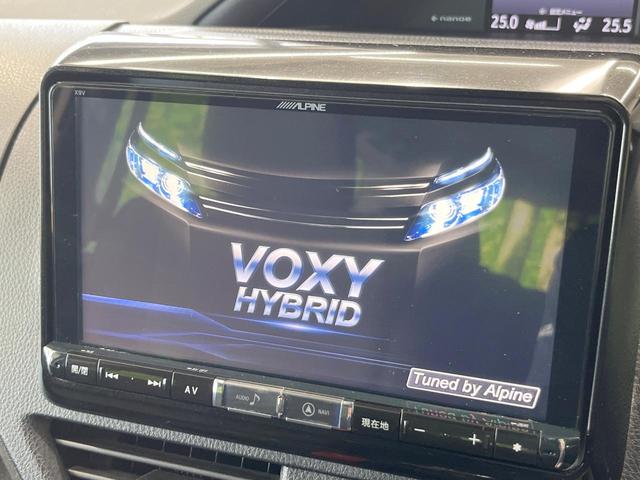 ヴォクシー ハイブリッドＶ　両側電動ドア　ＳＤナビ　バックカメラ　禁煙車　ドラレコ　コーナーセンサー　スマートキー　ＬＥＤヘッド　ビルトインＥＴＣ　クルコン　オートライト　デュアルエアコン　純正１５インチアルミ　リアエアコン（5枚目）