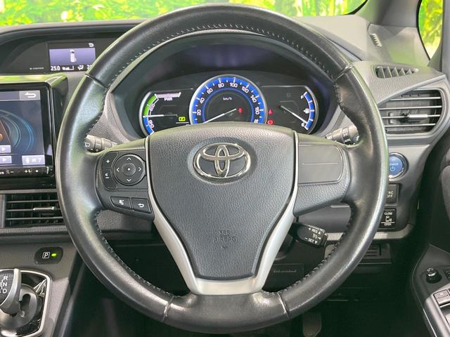 ヴォクシー ハイブリッドＶ　両側電動ドア　ＳＤナビ　バックカメラ　禁煙車　ドラレコ　コーナーセンサー　スマートキー　ＬＥＤヘッド　ビルトインＥＴＣ　クルコン　オートライト　デュアルエアコン　純正１５インチアルミ　リアエアコン（8枚目）