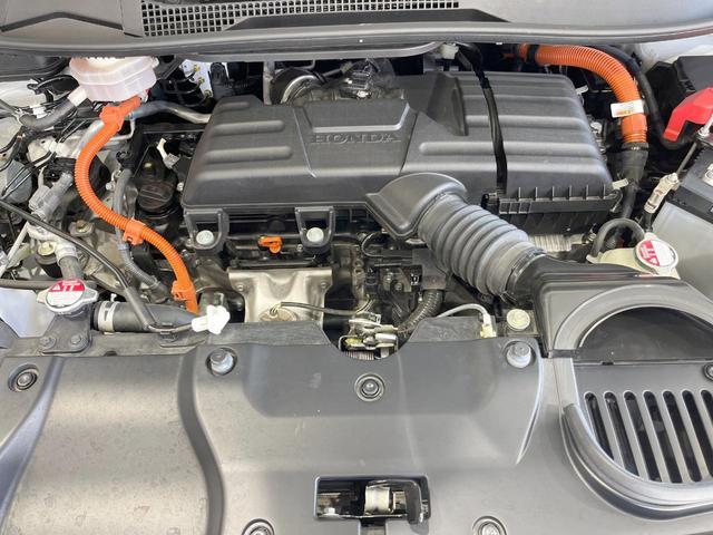 ステップワゴン e:HEVスパーダ プレミアムライン 両側電動ドア 純正SDナビ 全周囲カメラ 衝突被害軽減システム レーダークルーズ 禁煙車 ハーフレザーシート ドラレコ コーナーセンサー スマートキー LEDヘッド ビルトインETC 車線逸脱警報(18枚目)