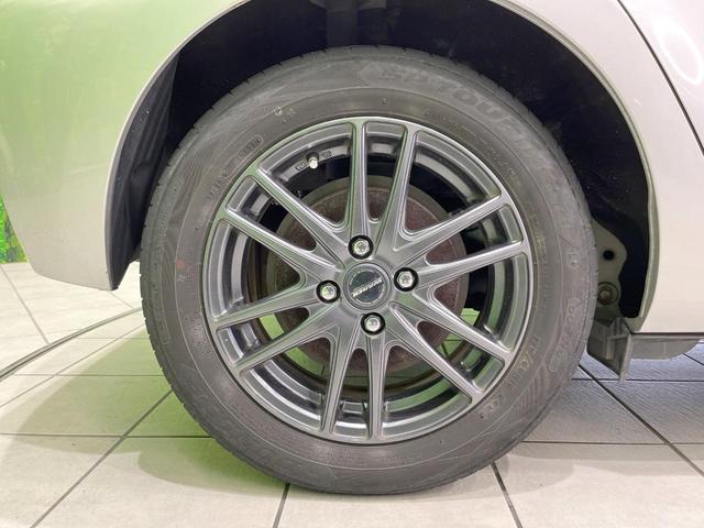 アクア Ｇ　純正ナビ　バックカメラ　スマートキー　ビルトインＥＴＣ　オートライト　オートエアコン　Ｂｌｕｅｔｏｏｔｈ　ＣＤ　ＤＶＤ再生　フルセグ　純正革巻きステアリング　トラクションコントロール（26枚目）