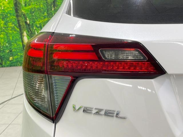 ヴェゼル ハイブリッドＺ　バックカメラ　衝突被害軽減システム　禁煙車　ハーフレザーシート　スマートキー　ＬＥＤヘッド　ＥＴＣ　クルコン　純正１８インチアルミ　オートライト　デュアルエアコン　Ｂｌｕｅｔｏｏｔｈ　ＣＤ（31枚目）