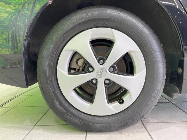 プリウス Ｓ　純正ナビ　スマートキー　ＨＩＤヘッド　ビルトインＥＴＣ　純正１５インチアルミ　オートエアコン　Ｂｌｕｅｔｏｏｔｈ　ＣＤ　ＤＶＤ再生　フルセグ　トラクションコントロール（26枚目）