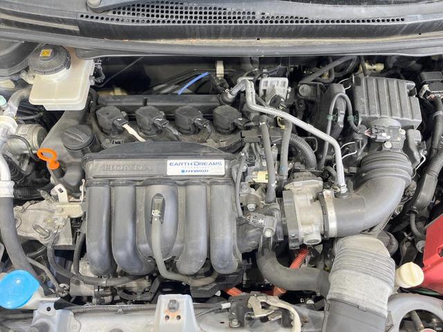 フィットハイブリッド Ｌパッケージ　衝突被害軽減システム　バックカメラ　ハーフレザーシート　スマートキー　ＬＥＤヘッド　ビルトインＥＴＣ　クルコン　オートライト　オートエアコン　ＣＤ　地デジ（18枚目）