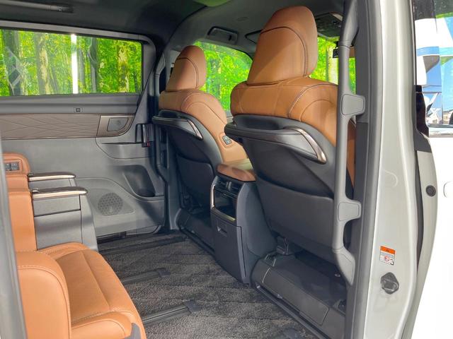 ヴェルファイアハイブリッド Z プレミア サンルーフ 両側電動ドア 後席モニター サイド・バックカメラ 衝突被害軽減システム レーダークルーズ 禁煙車 電動リアゲート レザーシート 前席シートエアコン リアシートエアコン 前後席パワーシート(66枚目)