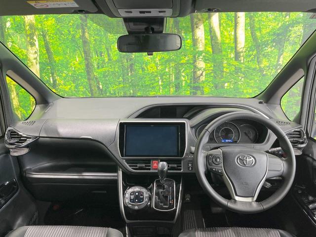 ヴォクシー ＺＳ　煌　両側電動ドア　純正ＳＤナビ　後席モニター　バックカメラ　衝突被害軽減システム　スマートキー　ＬＥＤヘッド　ビルトインＥＴＣ　クルコン　純正１６インチアルミ　オートハイビーム　車線逸脱警報（2枚目）