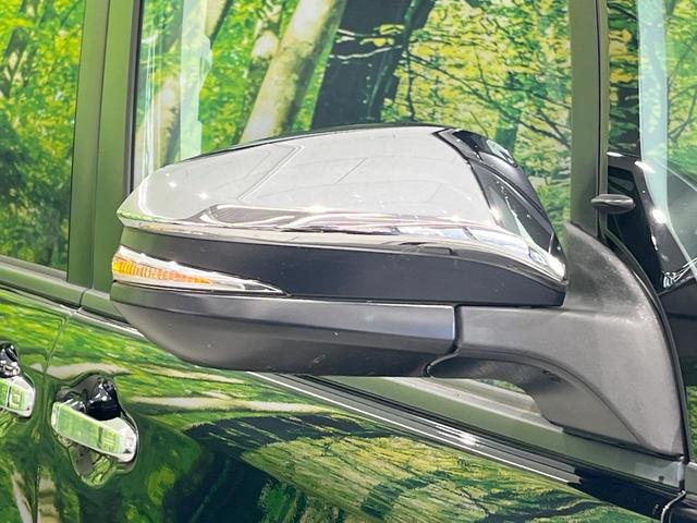 ヴォクシー ＺＳ　煌ＩＩ　両側電動ドア　後席モニター　バックカメラ　スマートキー　ＬＥＤヘッド　ビルトインＥＴＣ　純正１５インチアルミ　車線逸脱警報　オートライト　オートエアコン　Ｂｌｕｅｔｏｏｔｈ　ＣＤ　ＤＶＤ再生（28枚目）