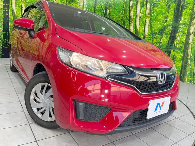 フィット １３Ｇ・Ｆパッケージ　純正ナビ　バックカメラ　ドラレコ　スマートキー　ＥＴＣ　オートエアコン　アイドリングストップ　Ｂｌｕｅｔｏｏｔｈ　ＣＤ　ＤＶＤ再生　地デジ　トラクションコントロール（12枚目）