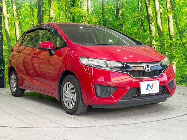 フィット １３Ｇ・Ｆパッケージ　純正ナビ　バックカメラ　ドラレコ　スマートキー　ＥＴＣ　オートエアコン　アイドリングストップ　Ｂｌｕｅｔｏｏｔｈ　ＣＤ　ＤＶＤ再生　地デジ　トラクションコントロール（16枚目）