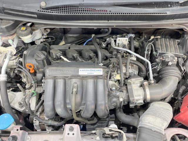 フィット １３Ｇ・Ｆパッケージ　純正ナビ　バックカメラ　ドラレコ　スマートキー　ＥＴＣ　オートエアコン　アイドリングストップ　Ｂｌｕｅｔｏｏｔｈ　ＣＤ　ＤＶＤ再生　地デジ　トラクションコントロール（18枚目）