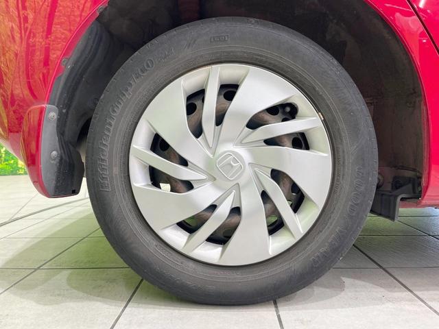 フィット １３Ｇ・Ｆパッケージ　純正ナビ　バックカメラ　ドラレコ　スマートキー　ＥＴＣ　オートエアコン　アイドリングストップ　Ｂｌｕｅｔｏｏｔｈ　ＣＤ　ＤＶＤ再生　地デジ　トラクションコントロール（26枚目）