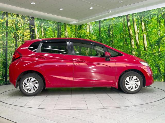 フィット １３Ｇ・Ｆパッケージ　純正ナビ　バックカメラ　ドラレコ　スマートキー　ＥＴＣ　オートエアコン　アイドリングストップ　Ｂｌｕｅｔｏｏｔｈ　ＣＤ　ＤＶＤ再生　地デジ　トラクションコントロール（30枚目）