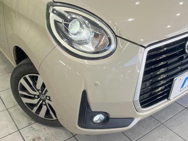 パッソ モーダ　チャーム　ＳＤナビ　衝突被害軽減システム　全周囲カメラ　ハーフレザーシート　コーナーセンサー　スマートキー　ＬＥＤヘッド　１００Ｖ電源　ビルトインＥＴＣ　純正１４インチアルミ　オートハイビーム（12枚目）