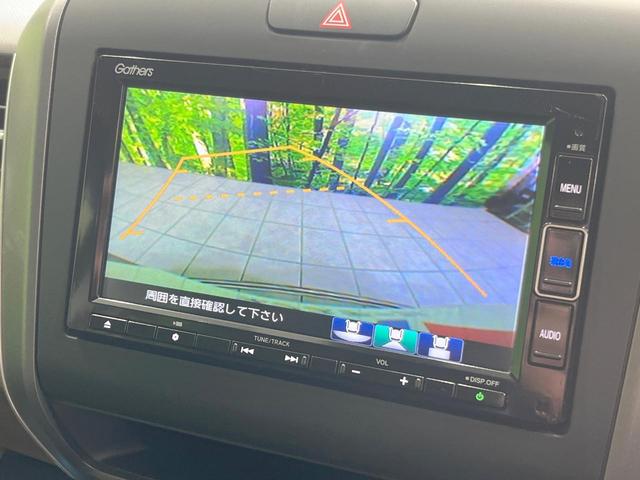 フリードハイブリッド ハイブリッド・Ｇホンダセンシング　両側電動ドア　純正ＳＤナビ　バックカメラ　衝突被害軽減システム　禁煙車　スマートキー　ＬＥＤヘッド　ビルトインＥＴＣ　車線逸脱警報　オートライト　オートエアコン　Ｂｌｕｅｔｏｏｔｈ　ＣＤ　ＤＶＤ再生（4枚目）