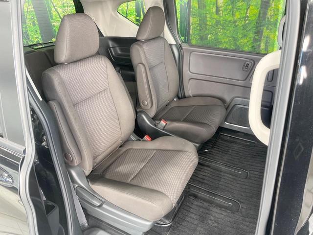 フリードハイブリッド ハイブリッド・Ｇホンダセンシング　両側電動ドア　純正ＳＤナビ　バックカメラ　衝突被害軽減システム　禁煙車　スマートキー　ＬＥＤヘッド　ビルトインＥＴＣ　車線逸脱警報　オートライト　オートエアコン　Ｂｌｕｅｔｏｏｔｈ　ＣＤ　ＤＶＤ再生（9枚目）