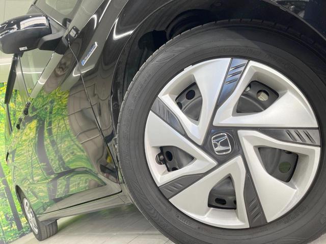 フリードハイブリッド ハイブリッド・Ｇホンダセンシング　両側電動ドア　純正ＳＤナビ　バックカメラ　衝突被害軽減システム　禁煙車　スマートキー　ＬＥＤヘッド　ビルトインＥＴＣ　車線逸脱警報　オートライト　オートエアコン　Ｂｌｕｅｔｏｏｔｈ　ＣＤ　ＤＶＤ再生（14枚目）