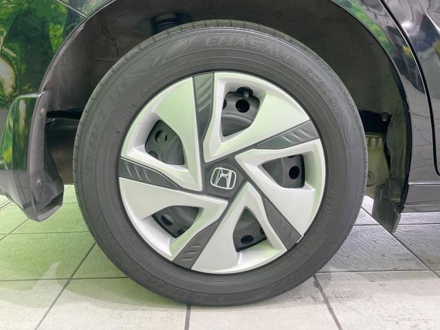 フリードハイブリッド ハイブリッド・Ｇホンダセンシング　両側電動ドア　純正ＳＤナビ　バックカメラ　衝突被害軽減システム　禁煙車　スマートキー　ＬＥＤヘッド　ビルトインＥＴＣ　車線逸脱警報　オートライト　オートエアコン　Ｂｌｕｅｔｏｏｔｈ　ＣＤ　ＤＶＤ再生（29枚目）