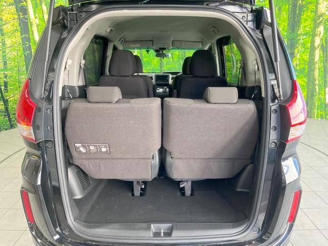 フリードハイブリッド ハイブリッド・Ｇホンダセンシング　両側電動ドア　純正ＳＤナビ　バックカメラ　衝突被害軽減システム　禁煙車　スマートキー　ＬＥＤヘッド　ビルトインＥＴＣ　車線逸脱警報　オートライト　オートエアコン　Ｂｌｕｅｔｏｏｔｈ　ＣＤ　ＤＶＤ再生（53枚目）