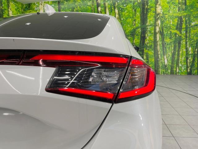 シビック ＥＸ　純正ナビ　衝突被害軽減システム　レーダークルーズ　バックカメラ　ドラレコ　スマートキー　ＬＥＤヘッド　ＥＴＣ２．０　ハーフレザーシート　純正１８インチアルミ　車線逸脱警報　オートライト　オートエアコン（49枚目）