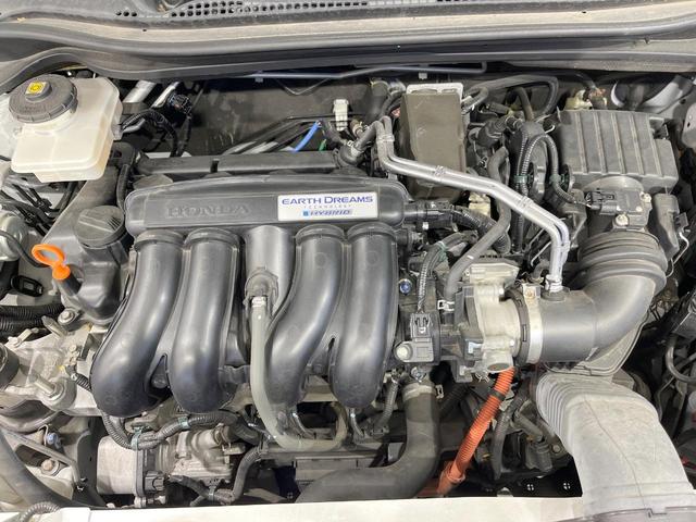 ヴェゼル ハイブリッドＲＳ・ホンダセンシング　純正ＳＤナビ　衝突被害軽減システム　レーダークルーズ　バックカメラ　ドラレコ　スマートキー　ＬＥＤヘッド　ハーフレザーシート　ビルトインＥＴＣ　純正１８インチアルミ　車線逸脱警報　オートライト（18枚目）