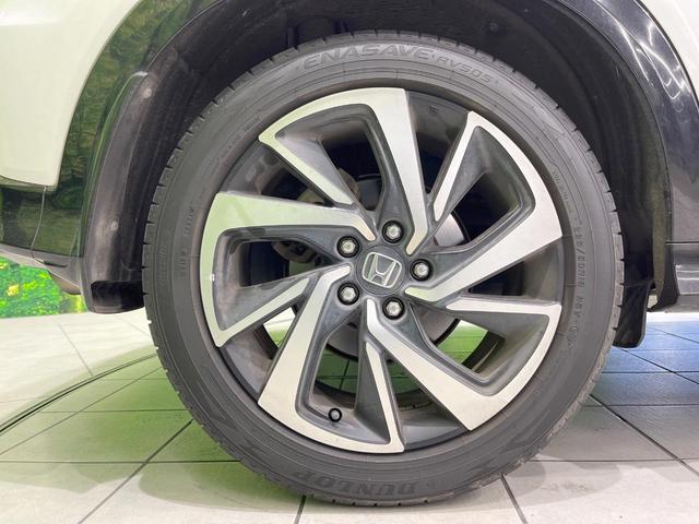 ヴェゼル ハイブリッドＲＳ・ホンダセンシング　純正ＳＤナビ　衝突被害軽減システム　レーダークルーズ　バックカメラ　ドラレコ　スマートキー　ＬＥＤヘッド　ハーフレザーシート　ビルトインＥＴＣ　純正１８インチアルミ　車線逸脱警報　オートライト（26枚目）