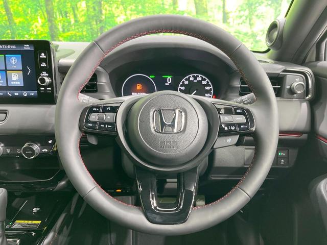 ヴェゼル ｅ：ＨＥＶ　ＲＳ　登録済未使用車　純正ナビ　衝突被害軽減システム　レーダークルーズ　全周囲カメラ　ＬＥＤヘッド　ＥＴＣ２．０　純正１８インチアルミ　ハーフレザーシート　コーナーセンサー　オートハイビーム　パークアシスト（11枚目）