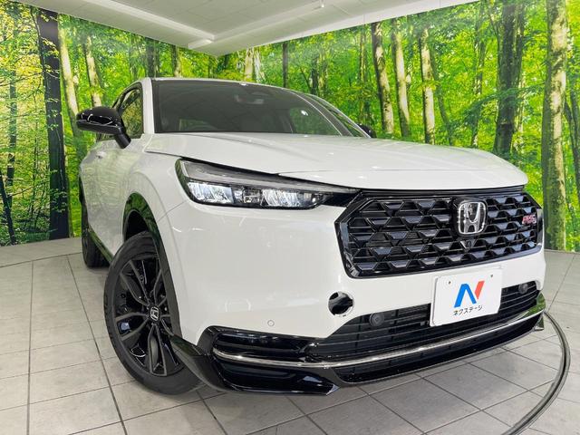 ヴェゼル ｅ：ＨＥＶ　ＲＳ　登録済未使用車　純正ナビ　衝突被害軽減システム　レーダークルーズ　全周囲カメラ　ＬＥＤヘッド　ＥＴＣ２．０　純正１８インチアルミ　ハーフレザーシート　コーナーセンサー　オートハイビーム　パークアシスト（12枚目）