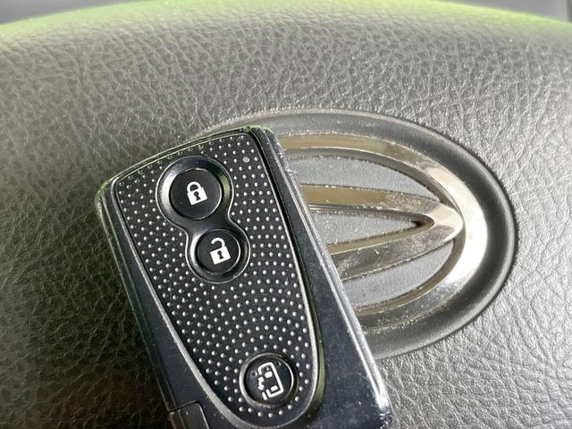 タント カスタムＸ　ＳＤナビ　電動スライドドア　バックカメラ　スマートキー　ＨＩＤヘッド　純正１４インチアルミ　オートエアコン　電動格納ミラー　トラクションコントロール　ＣＤ　パワーステアリング（6枚目）