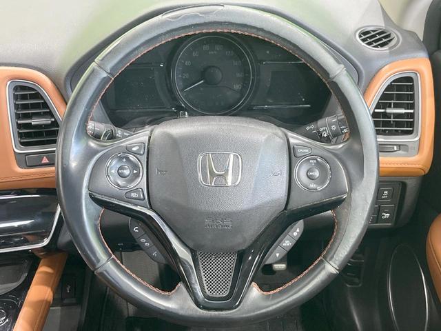 ヴェゼル ハイブリッドＺ・ホンダセンシング　ホンダセンシングレス　ＳＤナビ　バックカメラ　ハーフレザーシート　スマートキー　ＬＥＤヘッド　ビルトインＥＴＣ　クルコン　純正１７インチアルミ　オートライト　デュアルエアコン　ＤＶＤ再生　フルセグ（11枚目）