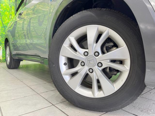 ヴェゼル ハイブリッドＸ・ホンダセンシング　純正ＳＤナビ　バックカメラ　衝突被害軽減システム　レーダークルーズ　禁煙車　ドラレコ　スマートキー　ＬＥＤヘッド　ビルトインＥＴＣ　純正１６インチアルミ　車線逸脱警報　オートライト　デュアルエアコン（13枚目）