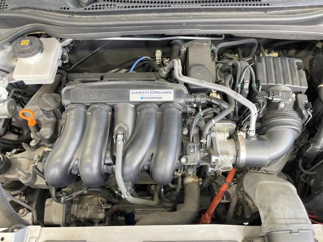ヴェゼル ハイブリッドＸ・ホンダセンシング　純正ＳＤナビ　バックカメラ　衝突被害軽減システム　レーダークルーズ　禁煙車　ドラレコ　スマートキー　ＬＥＤヘッド　ビルトインＥＴＣ　純正１６インチアルミ　車線逸脱警報　オートライト　デュアルエアコン（18枚目）