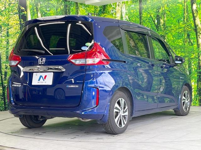 フリードハイブリッド ハイブリッド・ＥＸ　純正ＳＤナビ　衝突被害軽減システム　レーダークルーズ　両側電動ドア　後席モニター　バックカメラ　ドラレコ　スマートキー　ＨＩＤヘッド　ハーフレザーシート　前席シートエアコン　コーナーセンサー（18枚目）