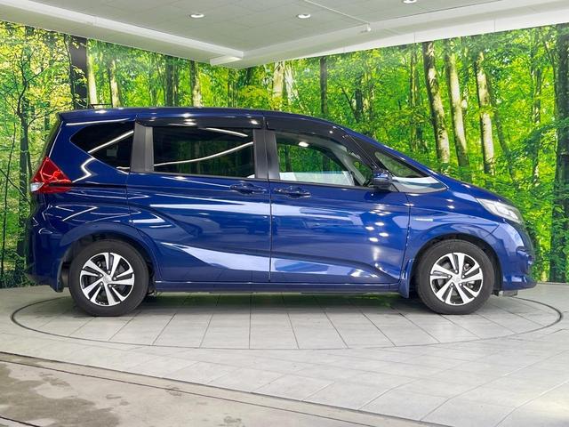 フリードハイブリッド ハイブリッド・ＥＸ　純正ＳＤナビ　衝突被害軽減システム　レーダークルーズ　両側電動ドア　後席モニター　バックカメラ　ドラレコ　スマートキー　ＨＩＤヘッド　ハーフレザーシート　前席シートエアコン　コーナーセンサー（31枚目）