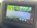 フリードハイブリッド ハイブリッド・Ｇホンダセンシング　両側電動ドア　純正ＳＤナビ　バックカメラ　衝突被害軽減システム　禁煙車　スマートキー　ＬＥＤヘッド　ビルトインＥＴＣ　車線逸脱警報　オートライト　オートエアコン　Ｂｌｕｅｔｏｏｔｈ　ＣＤ　ＤＶＤ再生（4枚目）