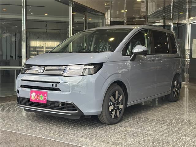 フリード e:HEVエアー EX 登録済未使用車 バックカメラ ブレーキサポート レーンサポート ソナー クルーズコントロール シートヒーター 両側電動スライドドア スマートキー アイドリングストップ オートエアコン 電動格納ミラー(4枚目)